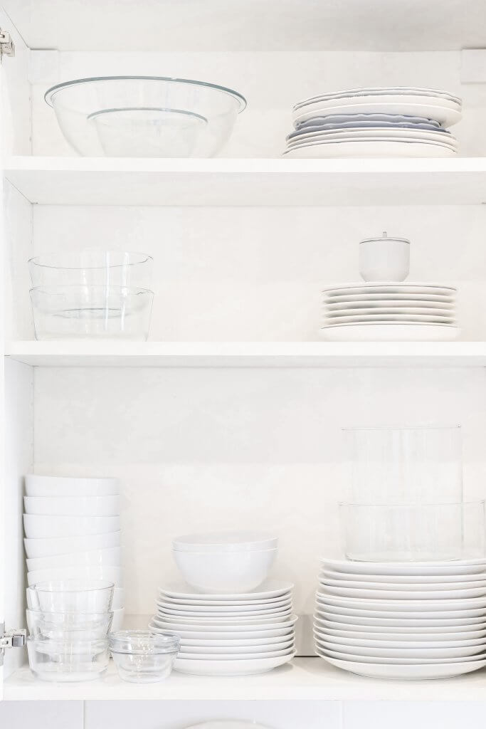 Organized kitchen cabinet with dishes